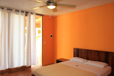The matrimonial rooms have a spacious queen bed.